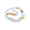 Pastel threading beads for toddlers